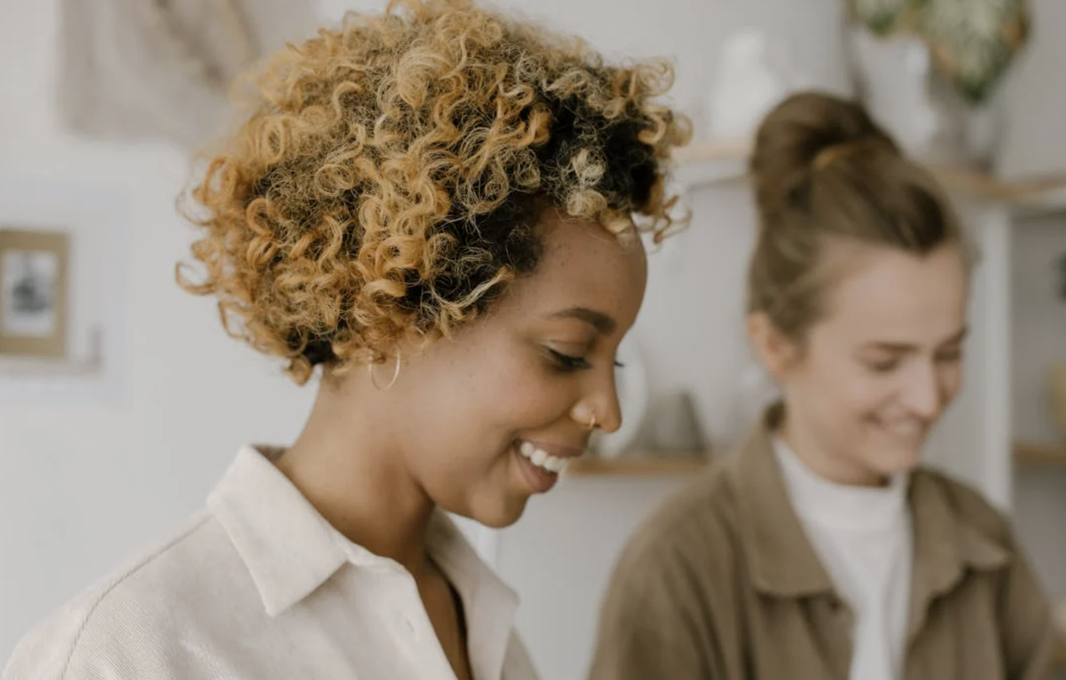 Two women working on a project.