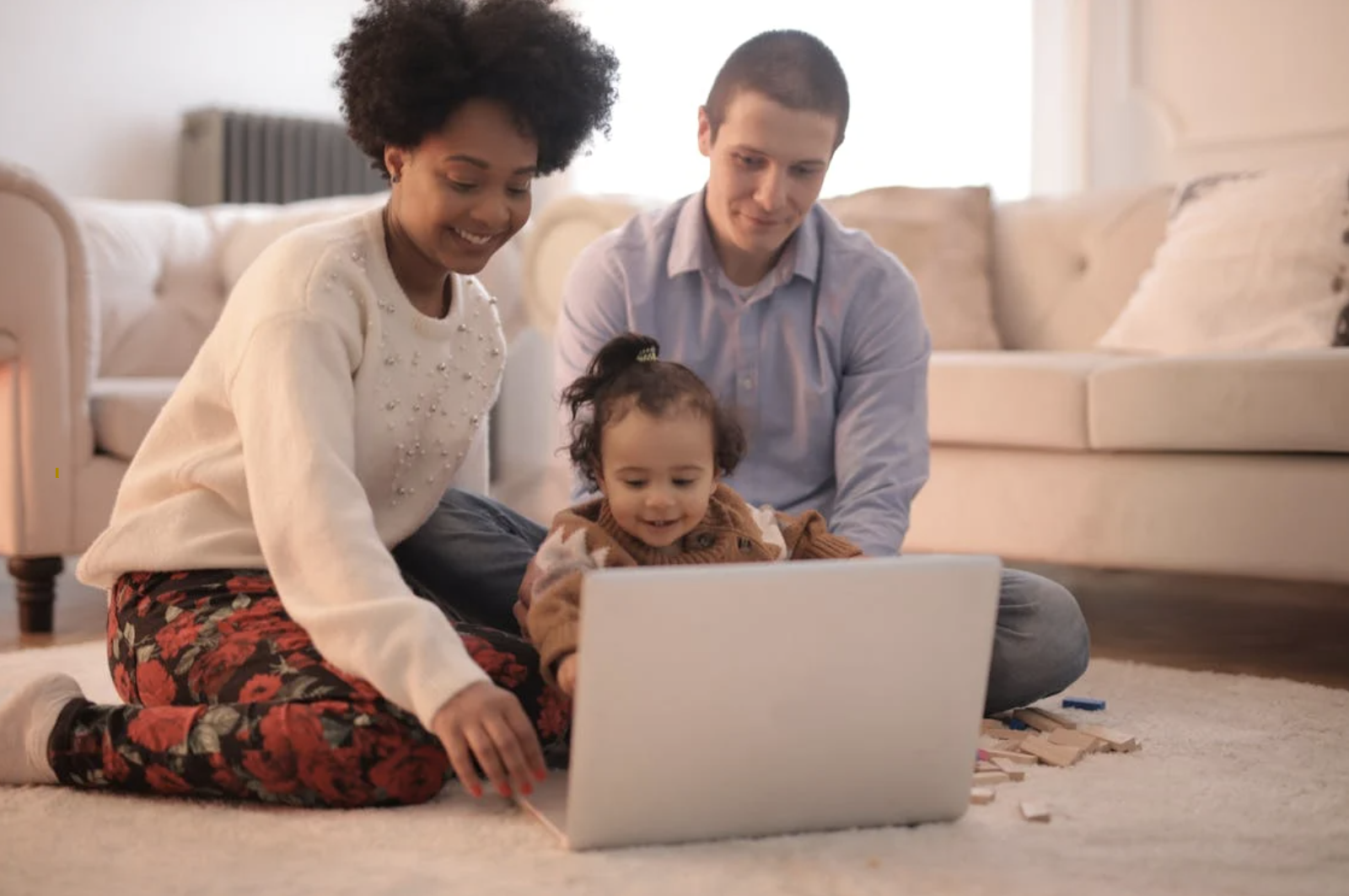 Two parents attending an online Zoom parenting workshop.