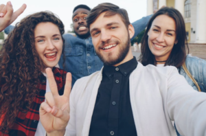 Four students take a selfie together